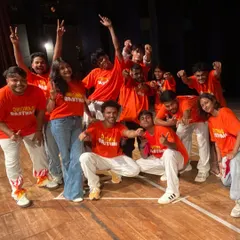 Meet the VibeTribe! This isn't just a class, it's a family. The energy and happiness in this post-show picture says it all. This is the community you become a part of.