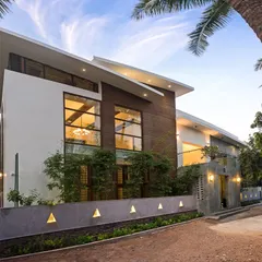 The facade of the Eco Terre residence demonstrates our expertise in modern residential architecture and eco-friendly renovation. We combined wood cladding, large glass panels, and clean lines to create a visually striking exterior that respects its natural surroundings.