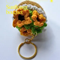 A detailed close-up of my sunflower bouquet keychain. I tried to capture the look of a real sunflower bouquet, just in miniature form. It's a little piece of sunshine.