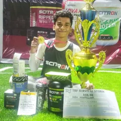 A closer look at the champion. Our student Yash Mhaprolkar with his trophy and prizes after winning a major fitness competition. His success is a direct result of the discipline and physical conditioning from his karate training.