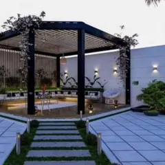 A modern, minimalist pergola design with clean lines and integrated lighting. This structure defines an elegant outdoor seating area, perfect for contemporary homes.