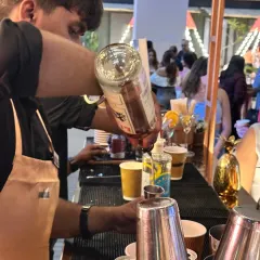 One of our mixologists in action, pouring drinks for guests at a busy brand event. Our team maintains professionalism and speed even during the busiest hours.