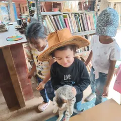 Interacting with animals teaches gentleness and empathy. Here, children get to meet and cuddle kittens during our visit to Hamsah Organic farm, a heartwarming experience for everyone.