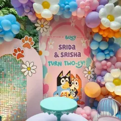 "This episode of Bluey is called... a birthday party!" We loved creating this sweet 'Two-ey' birthday for twins, featuring Bluey and Bingo, and a beautiful pastel balloon arch with daisies.