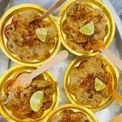 Our delicious Haleem, served in individual portions. Topped with crispy fried onions and a wedge of lime, this rich and savory dish is a festive specialty.