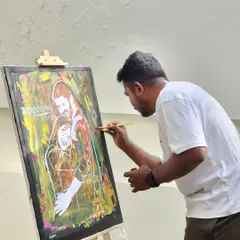 Here I am in my element, capturing the energy of the event. I paint live on-site, translating the sounds, colors, and emotions of the moment directly onto the canvas with each brushstroke.