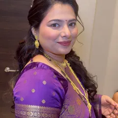 A beautiful and elegant 'sider' look for a wedding guest. The makeup is soft and sophisticated, enhancing her features without being too heavy, perfect for a mature skin type.