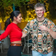 Even with faces covered in Holi colors, the joy of dancing shines through. It was a truly memorable themed night.
