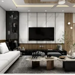 This living room design emphasizes texture and light, with a marble-clad TV wall, vertical wooden slats, and integrated display shelving. The layout is designed to be open and inviting, perfect for both relaxation and social gatherings.