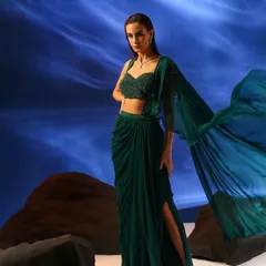 For this fashion campaign, I styled an elegant, modern ethnic look. The flowing emerald green fabric and intricate beaded blouse highlight my expertise in creating dramatic and memorable visuals for contemporary Indian wear brands.