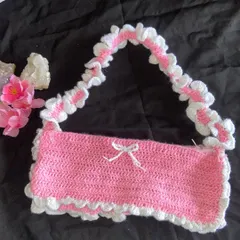 A clear shot of the pink and white ruffle bag on its own. The strap has this cute scrunchie-like ruffle effect that I create by hand.