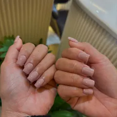 The clean lines of the square shape combined with a perfect nude polish create a timelessly chic manicure.