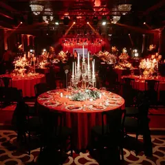 The Sangeet night in Antalya was a vision in red. The grand ballroom was transformed with dramatic lighting and opulent table settings, featuring tall candelabras and rich red linens for a truly royal feel.