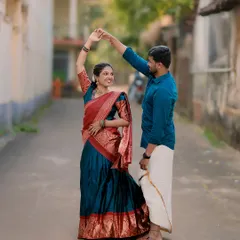 A joyful dance in the middle of a quiet street. The bride-to-be's traditional half saree adds a beautiful splash of color and culture.