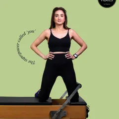 The superpower was always you. Pilates just helps you bring it out. This is a moment of pure strength and confidence on the Reformer, showcasing the power that lies within you.