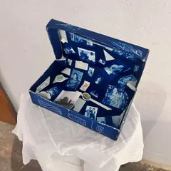 A beautiful memory box created by a participant during our Photography and Cyanotype workshop with artist Sina Niemeyer. The box is adorned with cyanotype prints made during the session.