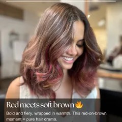 Red meets soft brown. This look is bold and fiery, wrapped in warmth. It's pure hair drama in the best way possible.