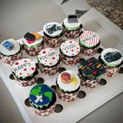 A full set of personalized chocolate cupcakes. Each one tells a part of the story, making them a perfect, unique gift for a birthday.