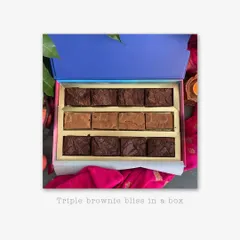 For all the brownie lovers, I present The Brownie Box. This box is pure indulgence, featuring three of my signature flavors: decadent Nutella chocolate brownies, rich Biscoff chocolate brownies, and sweet brown sugar vanilla blondies. Each piece is incredibly fudgy and baked to perfection.
