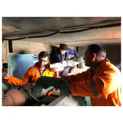 Our team is seen here conducting a detailed inspection of an industrial pipe and valve system. This meticulous audit work is the first step in identifying energy saving opportunities for our clients.