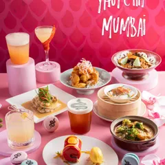 A vibrant and colourful spread for Yautcha Mumbai. This image balances dim sum, cocktails, and desserts in a single frame, using a monochromatic pink theme to create a visually cohesive and striking composition.
