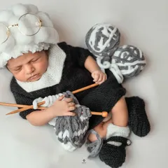 Who says newborns can't have a sense of humor? This playful "grandma" setup, complete with a yarn wig, tiny glasses, and knitting needles, is an example of how I love to get creative and design a truly one-of-a-kind newborn photoshoot.