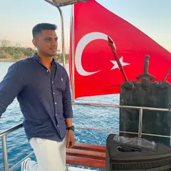 Posing by the Turkish flag on a boat in Antalya. I am grateful for the opportunities to travel and share my music with people all over the world.