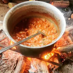 The secret to our authentic biryani is in the traditional preparation. Here, our Mutton Dum Biryani is slow-cooked over firewood, infusing it with a smoky aroma that you just can't replicate.