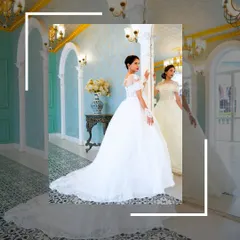 A full-length shot of the white Catholic gown, capturing its grandeur as the bride looks into a mirror.