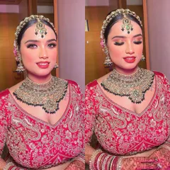 A closer look at the final bridal makeup. Notice the sculpted cheeks, sharp eye makeup, and bold red lip that come together for a timeless and glamorous bridal look.