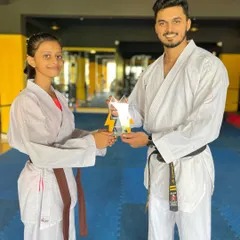 Awarding one of our "Best Fighter of the Year" trophies. This student has shown exceptional spirit and technique in sparring.