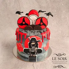 For all the anime fans, here's an Itachi Uchiha cake that was so much fun to design. This Milk & Cookies cake features a 2D fondant Itachi, his Sharingan, and a dramatic red and grey buttercream finish with a blood-drip effect.