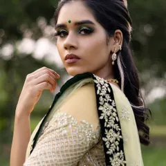 A striking portrait of the model Malavika. The intense eye makeup is the star of the show, demonstrating how to create a look that is both artistic and beautiful.