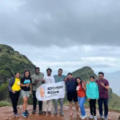 Our tribe on top of the world in Chikmagalur. This is the reward after a challenging and beautiful trek through the hills. The sense of accomplishment and the shared joy is what makes these group adventures so special.