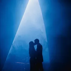 Creating that perfect, dreamy moment for a couple's first dance is my specialty. This silhouette shot captures the romance I help bring to life on stage, making it a memory you'll cherish forever.