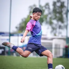 A player unleashes a powerful shot during a DPDL Super Cup match. We train our players to be confident and decisive in front of goal.