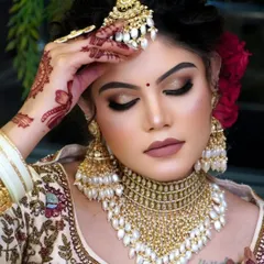 Another view of the gold-plated and pearl choker set, showing the intricate details and how it looks with bridal makeup.