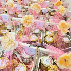 I created 65 of these vibrant hampers for a Haldi ceremony in just five days. The bright pink and yellow theme, filled with jars of snacks, chocolates, and a custom caricature of the couple, brought so much energy and joy to the celebration.