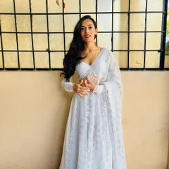 Dressed for a beautiful wedding reception in an elegant white lehenga. I adapt my style to match the tone of your event, whether it calls for timeless grace or modern glamour.