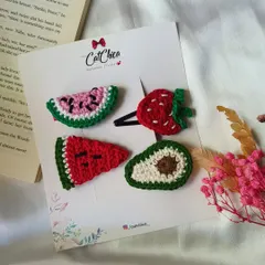 Fun and fruity! This set of crochet clips features a watermelon slice, a strawberry, and an avocado. They are handmade and look super cute on clips or headbands.