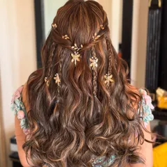 We created this gorgeous carnival-inspired hairdo with beautiful curls and golden dragonfly accessories. Hair is a crucial part of the look, and we curate it to perfection.