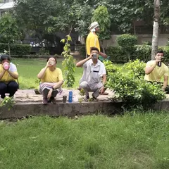 Our students practicing Jal Neti in an outdoor setting. This yogic kriya is excellent for clearing the nasal passages, relieving allergies, and improving respiratory function.