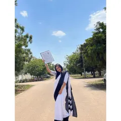 Holding my degree high during my 2022 convocation. This piece of paper is a testament to the power of perseverance, a core value I emphasize in my legal career coaching.