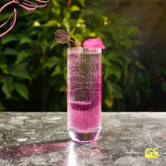 Pretty in pink. This sparkling pink cocktail, garnished with an edible flower, is as beautiful to look at as it is refreshing to drink.