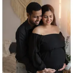 The shared smiles and gentle touch in this photo say everything. I love capturing these genuinely happy moments between couples as they celebrate the baby they are about to welcome.