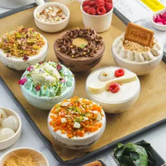 I believe in creative desserts that blend tradition with modern flair. Our Fusion Globe Cakes are a perfect example, featuring unique combinations like Paan Rasmalai, Thandai Cheesecake, and Parle-G Tres Leches, all handcrafted and beautifully presented.