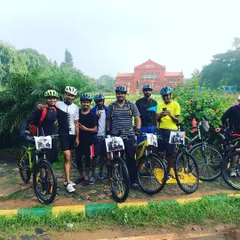 The crew gathered in front of the iconic red Attara Kacheri (High Court) building in Cubbon Park.
