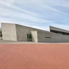 Zaha Hadid's Vitra Fire Station, her first built work. It is a frozen explosion of concrete, a radical exploration of form that broke new ground and continues to inspire.
