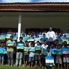My students at Gogamukh College proudly displaying the landscape paintings they created during our workshop. It is so rewarding to see them all holding their finished artwork.