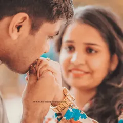 A gentle, romantic gesture during a pre-wedding session. This close-up highlights the tenderness and affection that tells your unique love story.